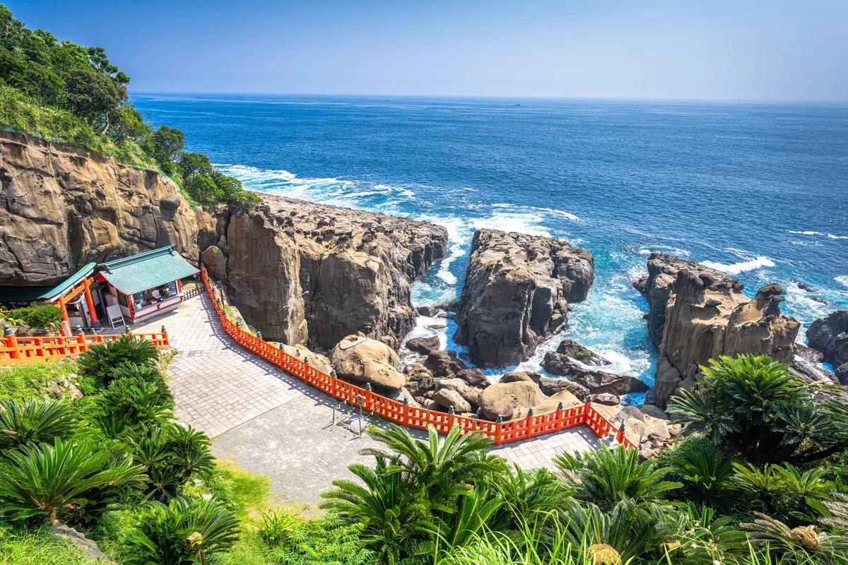 Udo Jingu Shrine seen from above, with the rocky shore and the sea